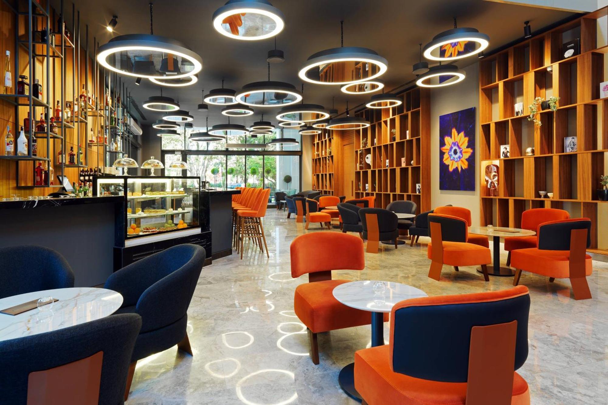 Sheraton Batumi Hotel Εξωτερικό φωτογραφία The interior of a Starbucks Reserve store in Shanghai, China