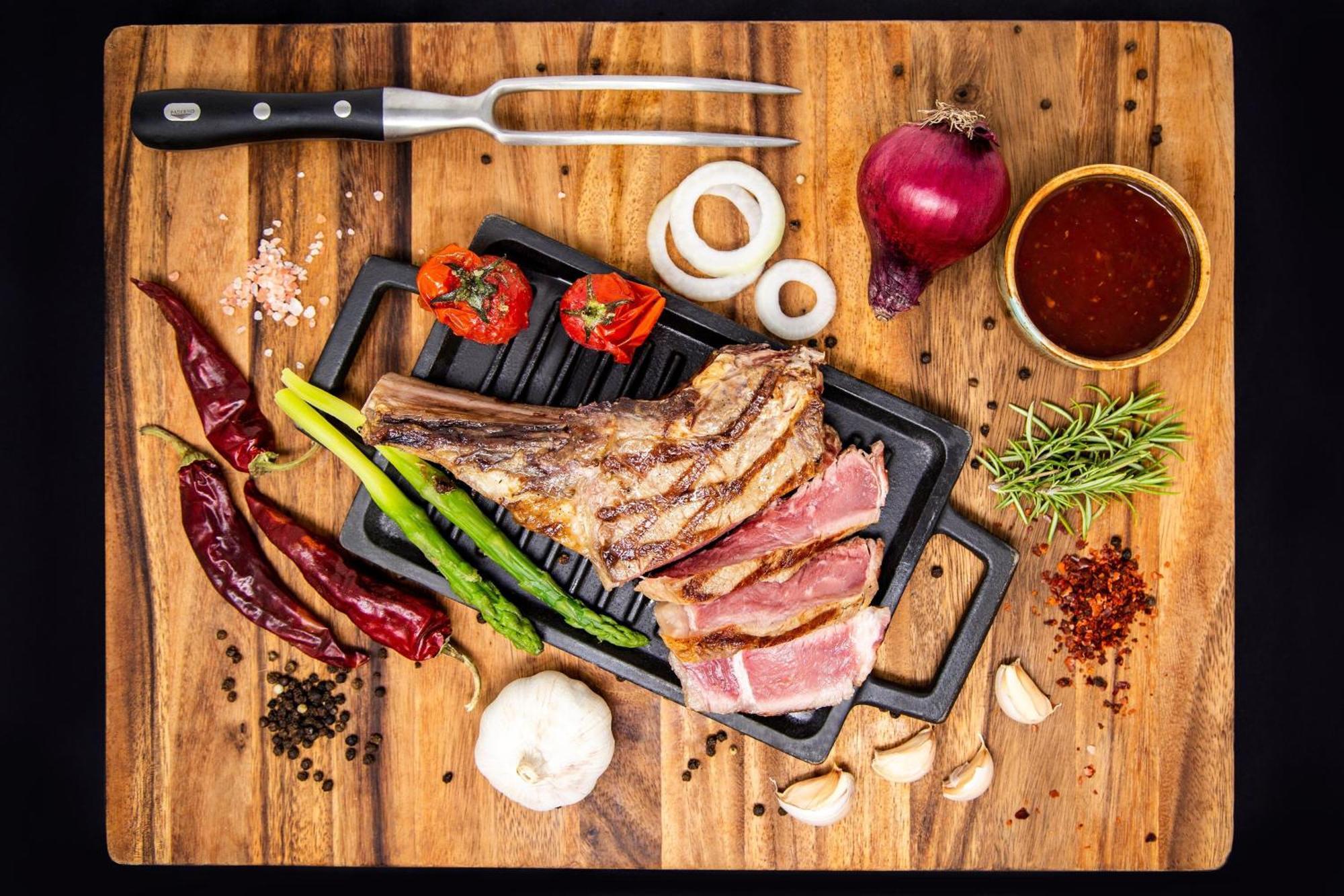 Sheraton Batumi Hotel Εξωτερικό φωτογραφία A steak on a cutting board